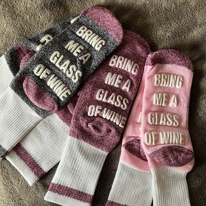 3 pair of “Bring Me Wine” slipper socks; women’s size 9-11.